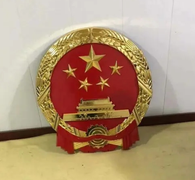 国徽设计中的稻穗与齿轮象征了什么